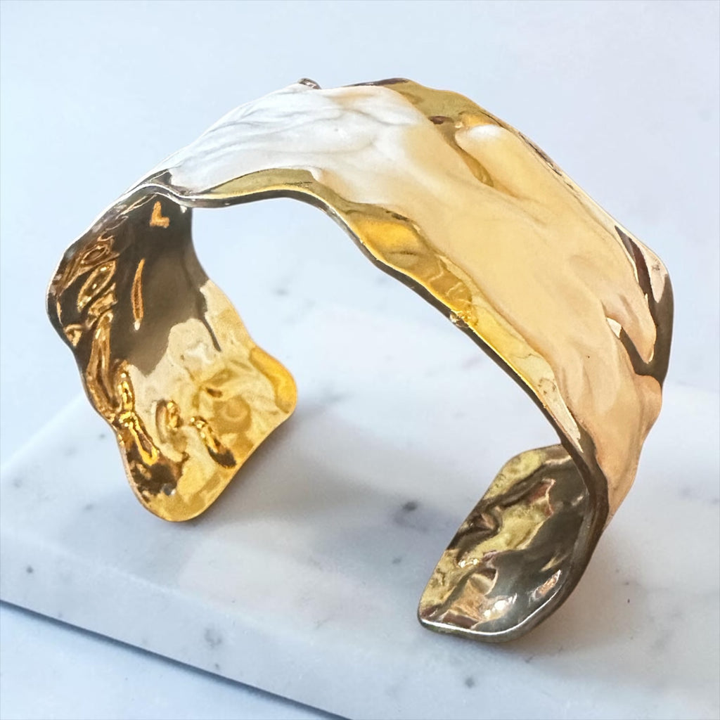 White bracelet with gold