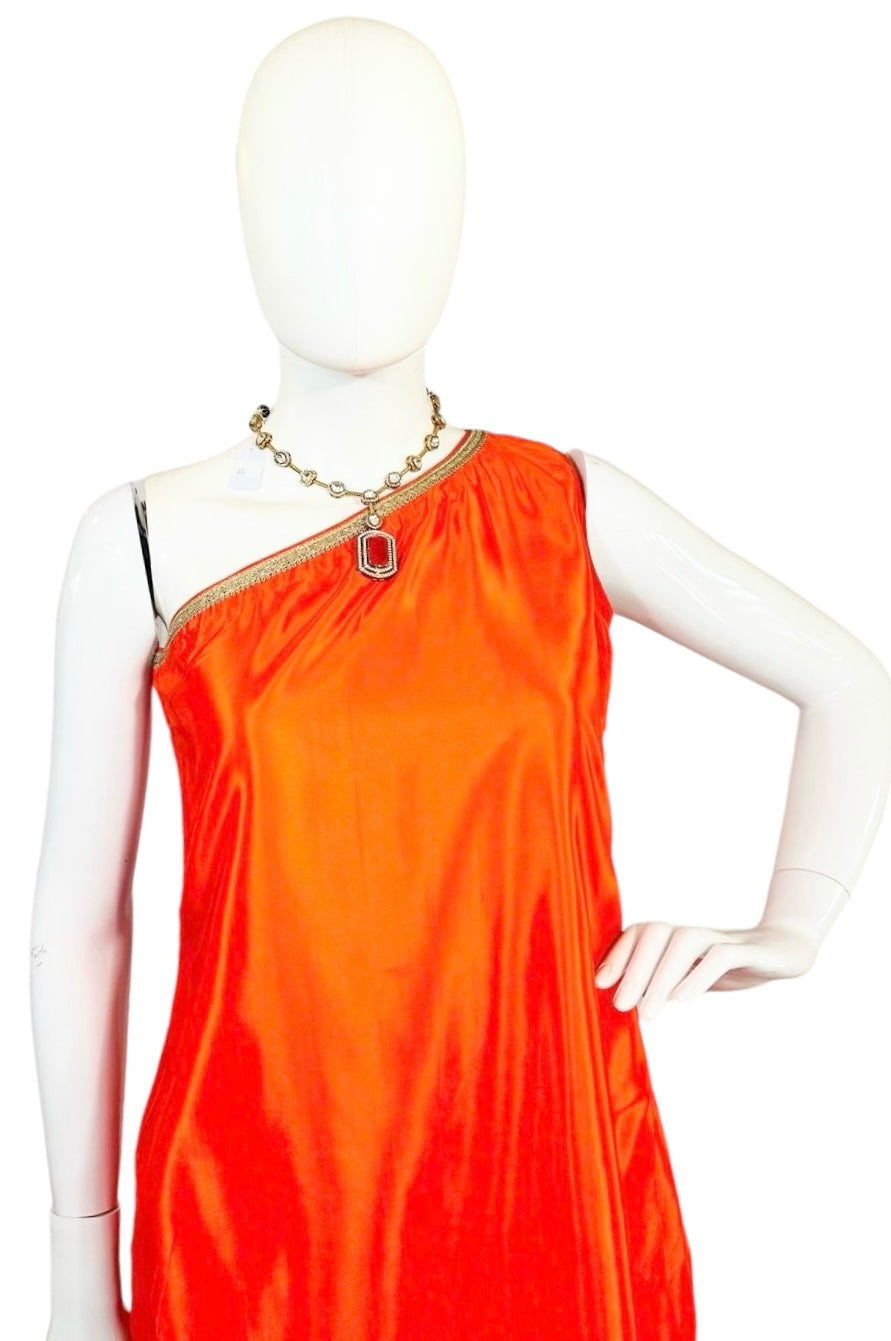 Orange one-shoulder outfit