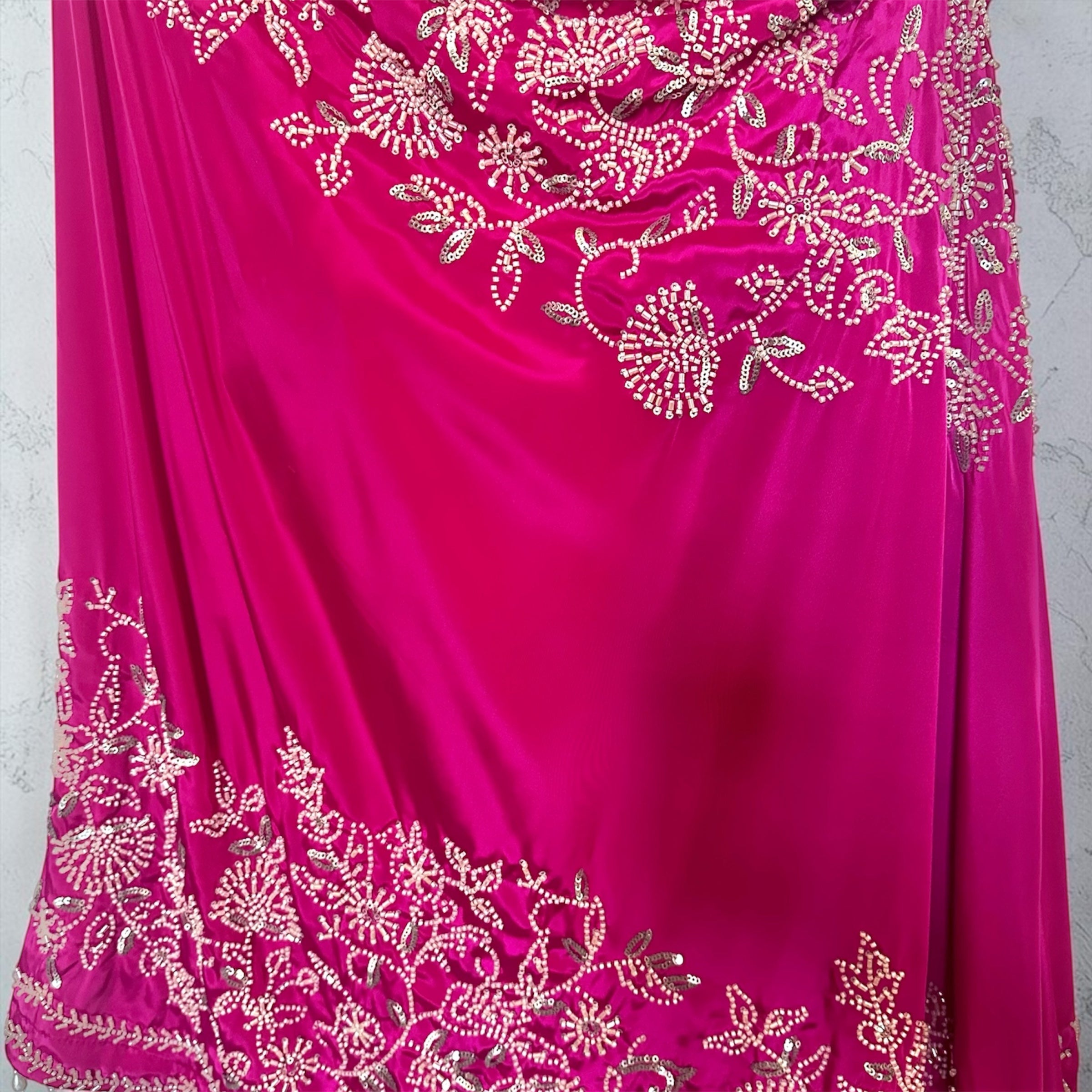 Hot pink one-shoulder outfit