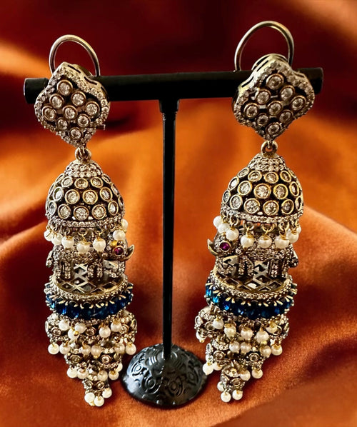 Ad earrings with blue stones