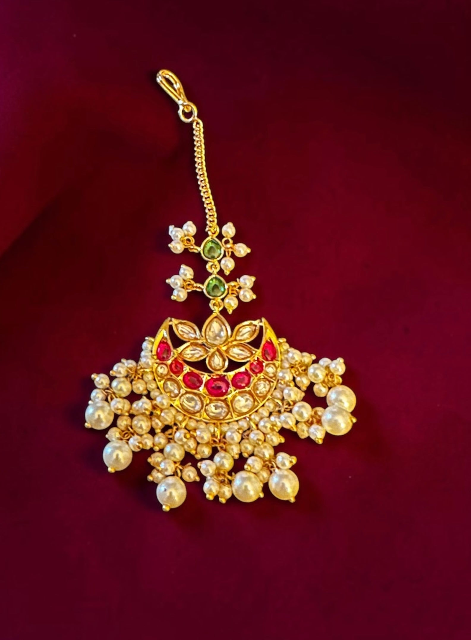Ruby & green kundan maang tikka
