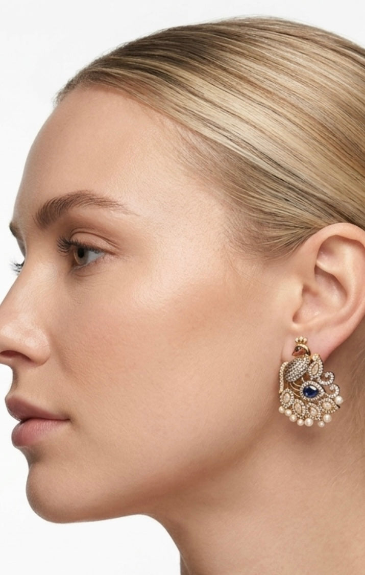 Peacock motif ad studs