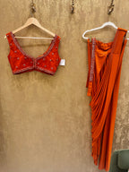 Burnt orange stitched saree