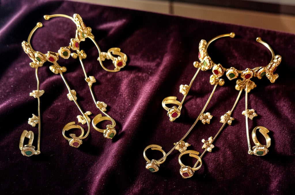 Ruby/emerald hand jewelry