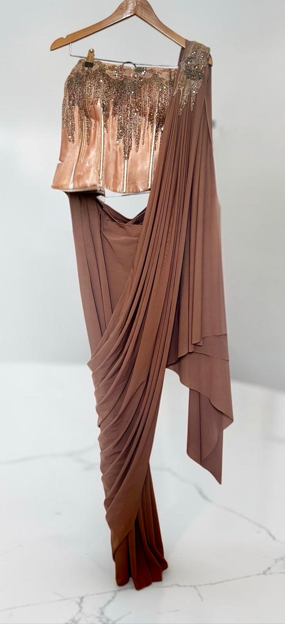 Taupe color stitched lycra saree