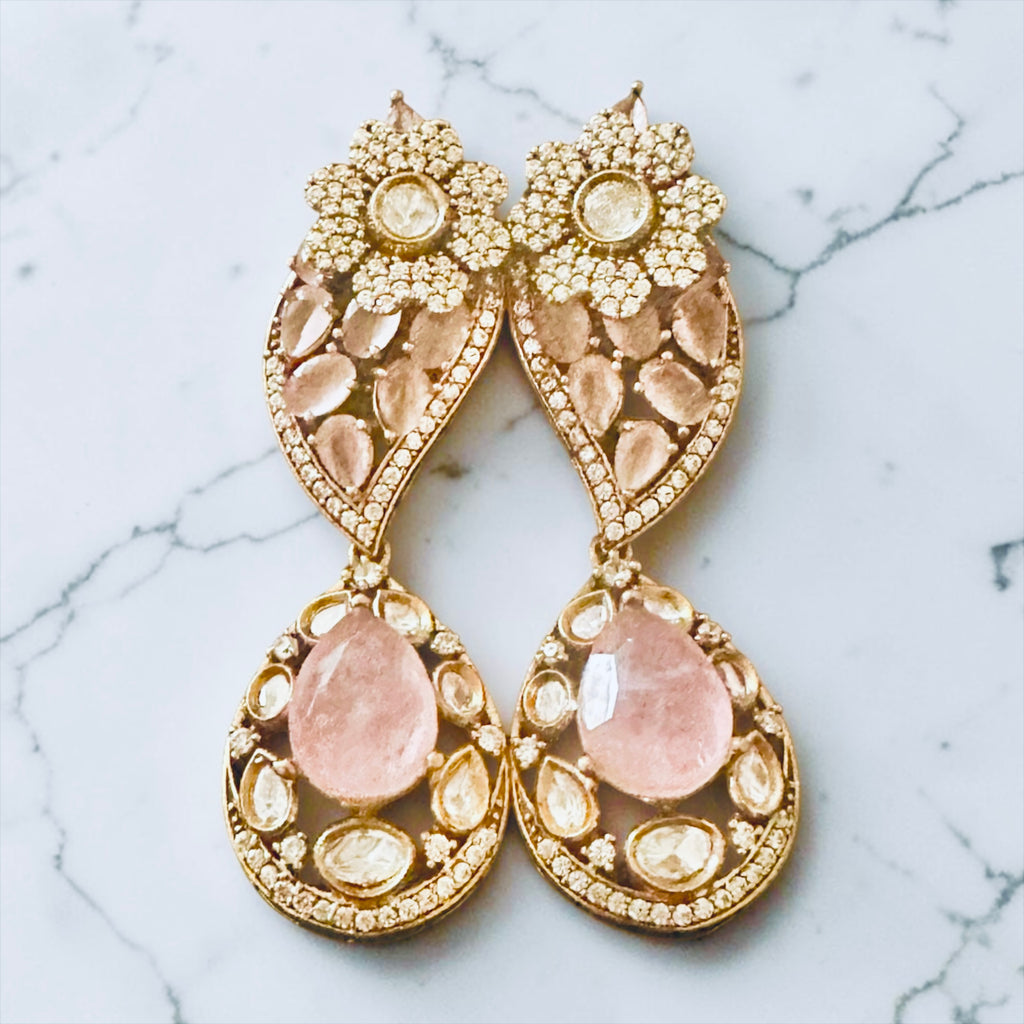 Pink stone ad earrings