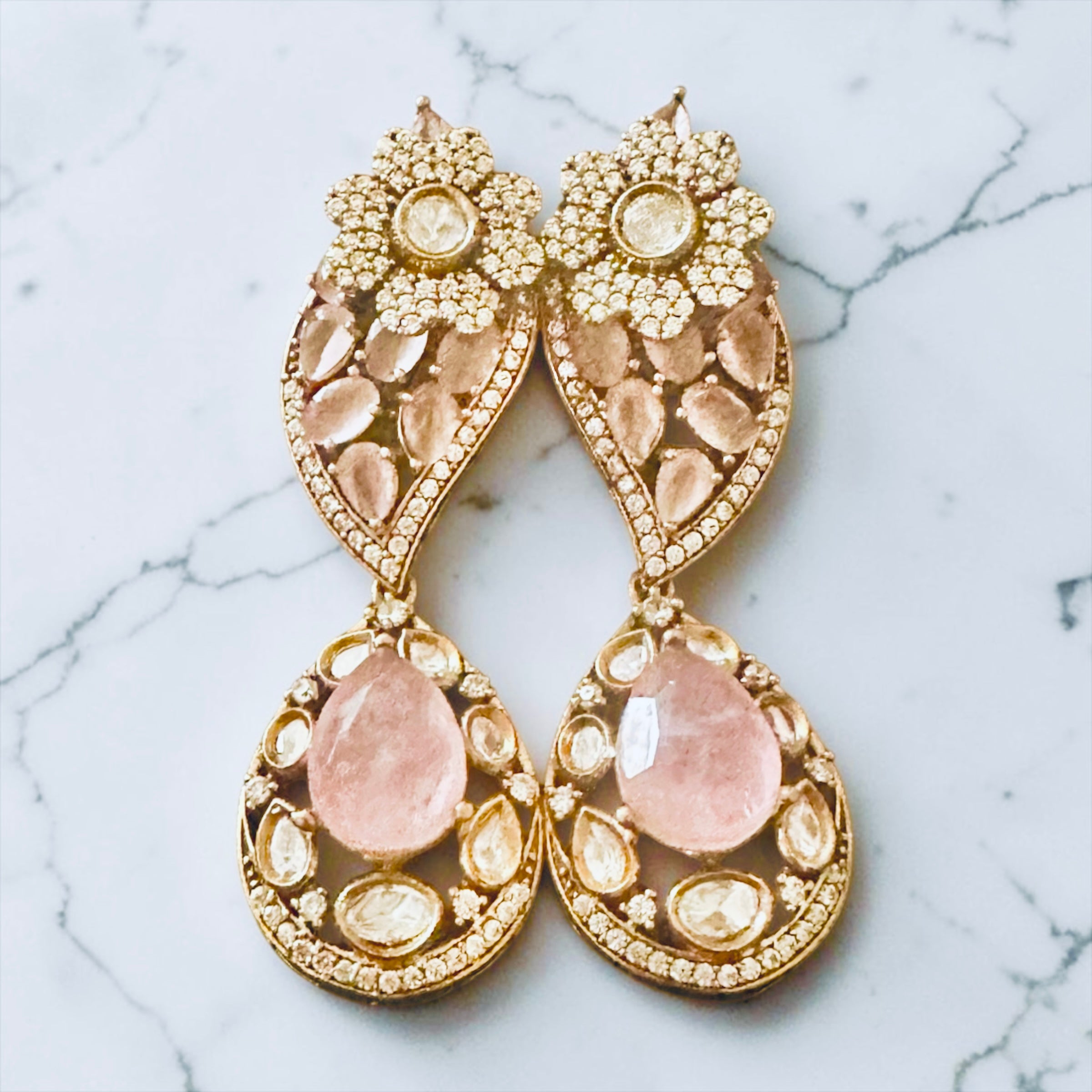 Pink stone ad earrings