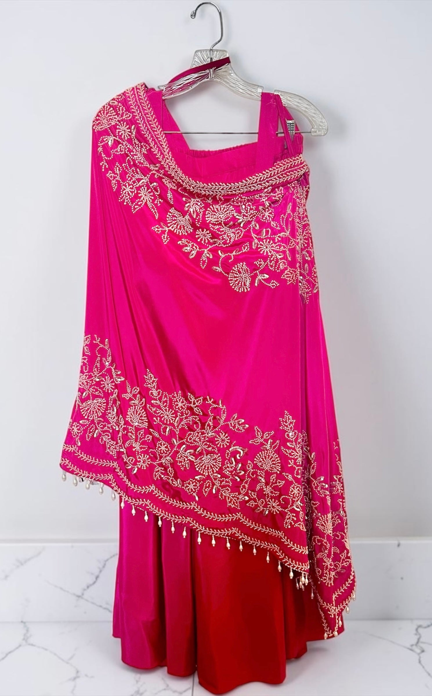 Hot pink one-shoulder outfit