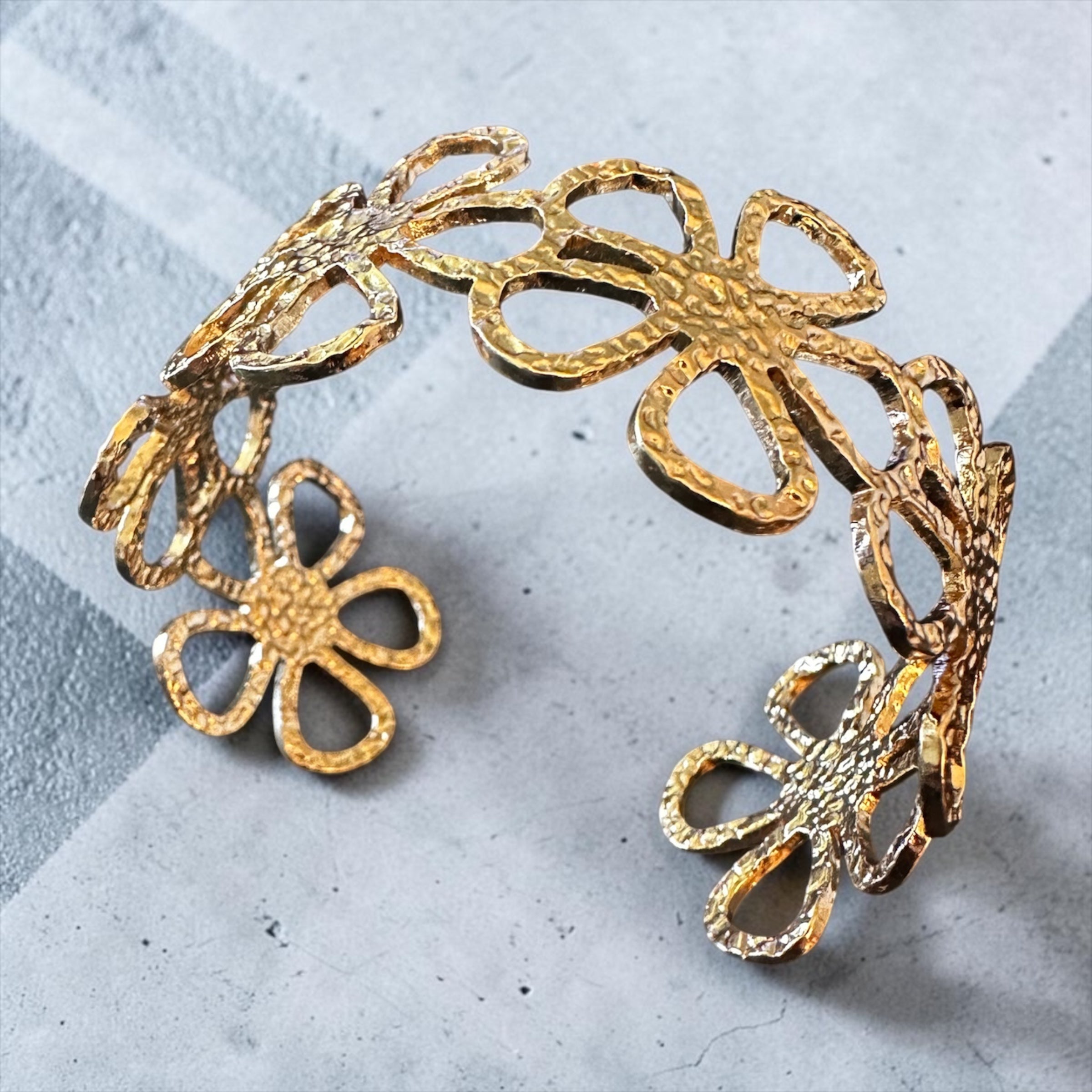 Floral gold finish bracelet