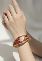Reddish orange ad bracelet