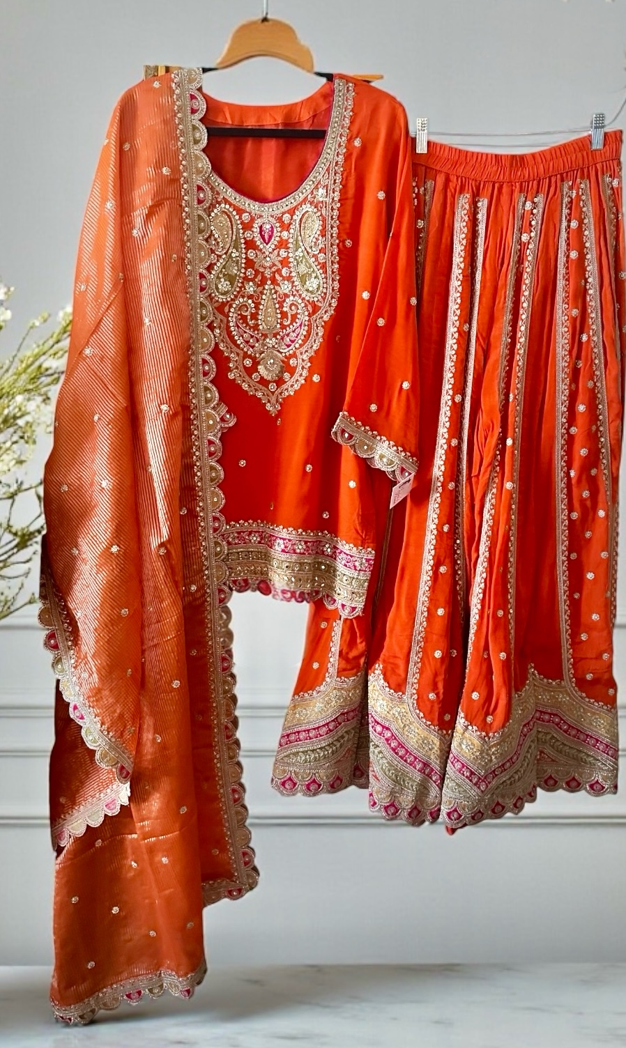 Orange colored Sharara suit