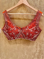Burnt orange stitched saree