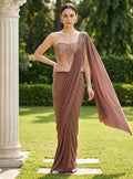 Taupe color stitched lycra saree
