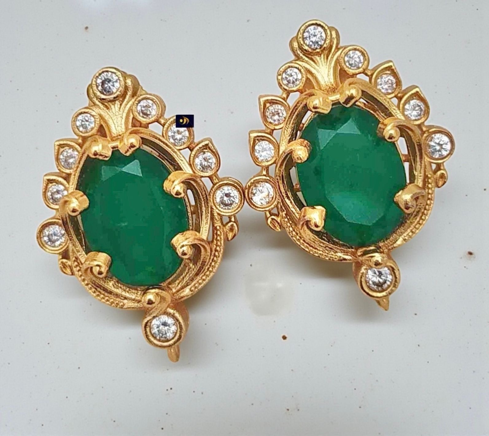 Emerald green studs