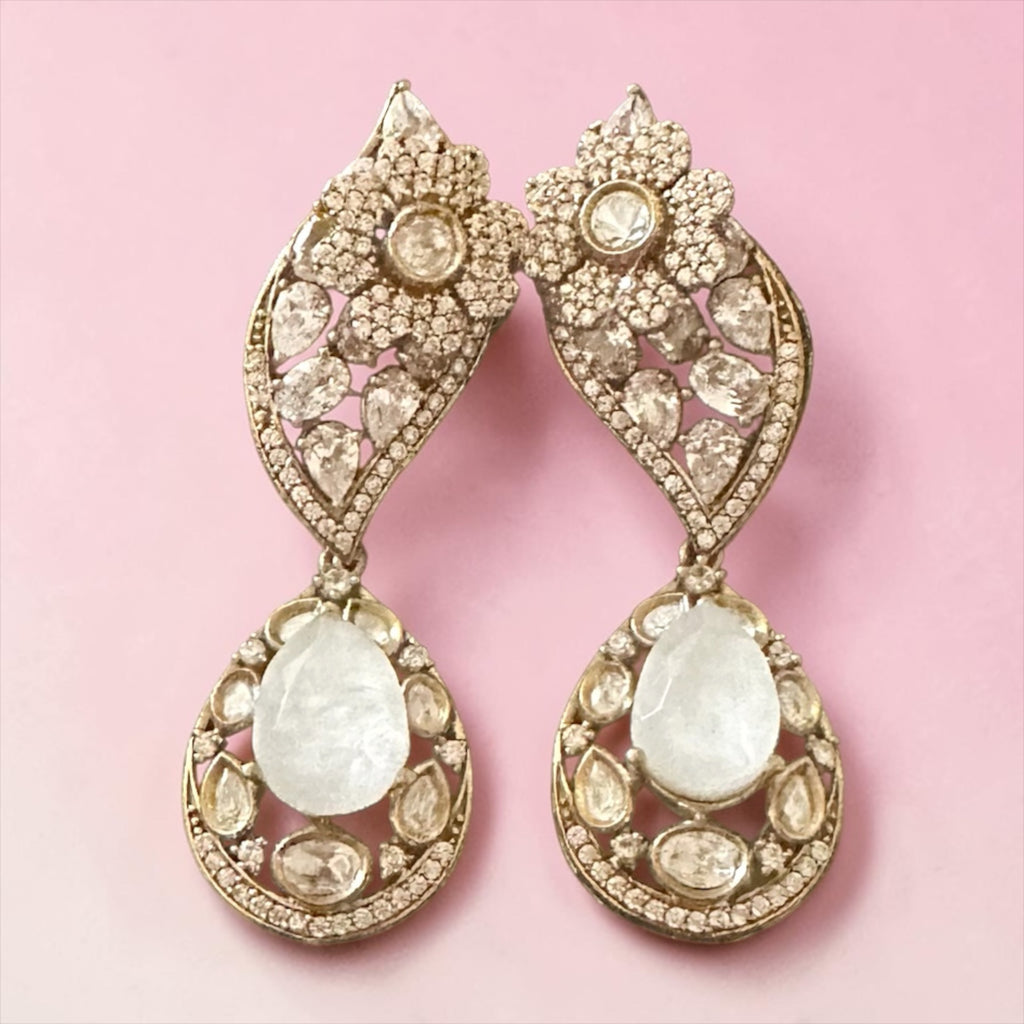 White stone ad earrings