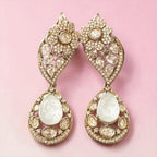 White stone ad earrings