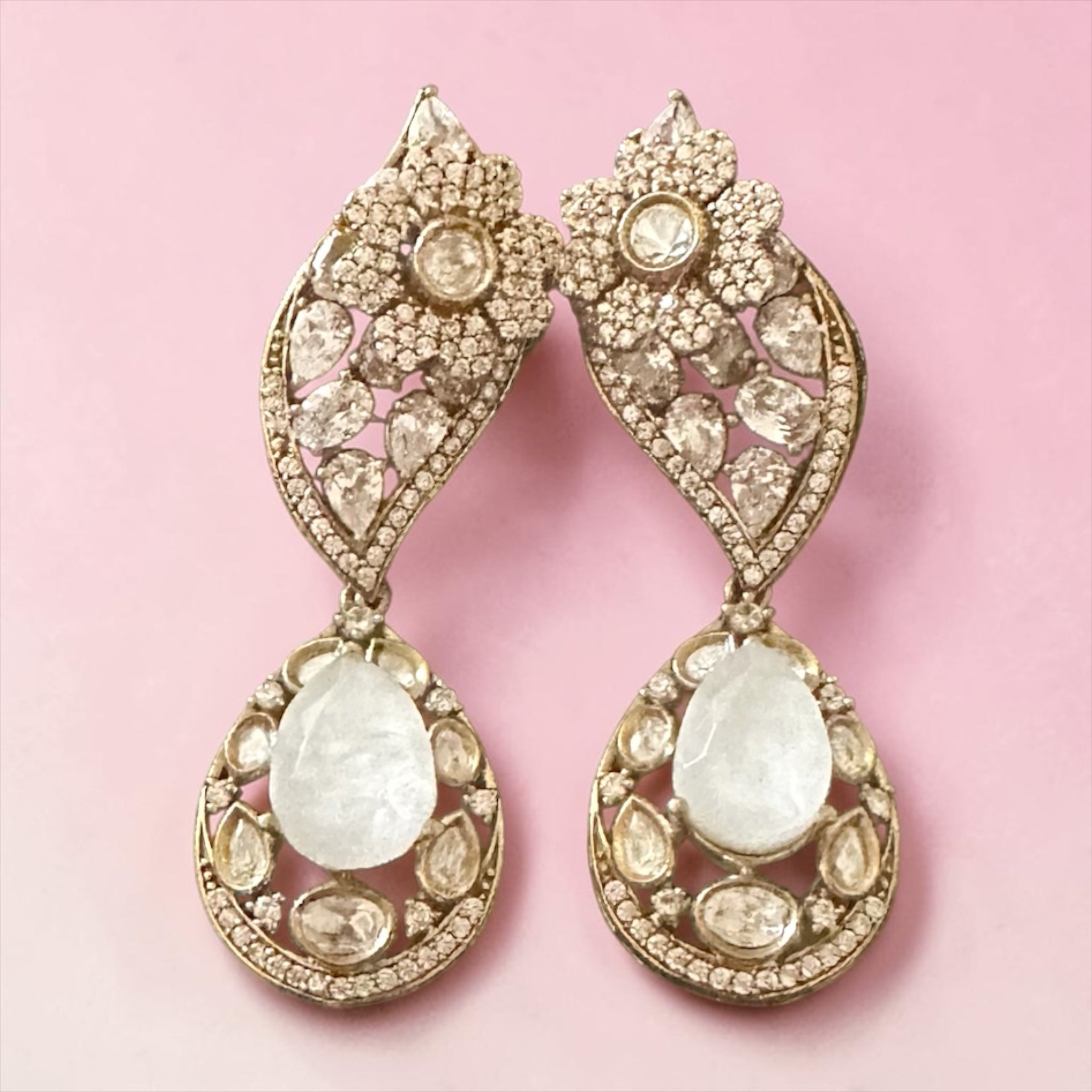 White stone ad earrings