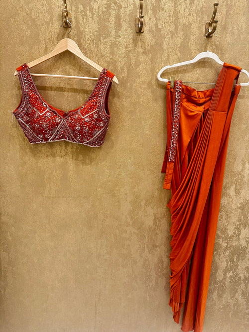 Burnt orange stitched saree