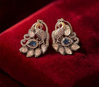Peacock motif ad studs