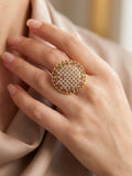 Emerald with ad stones ring