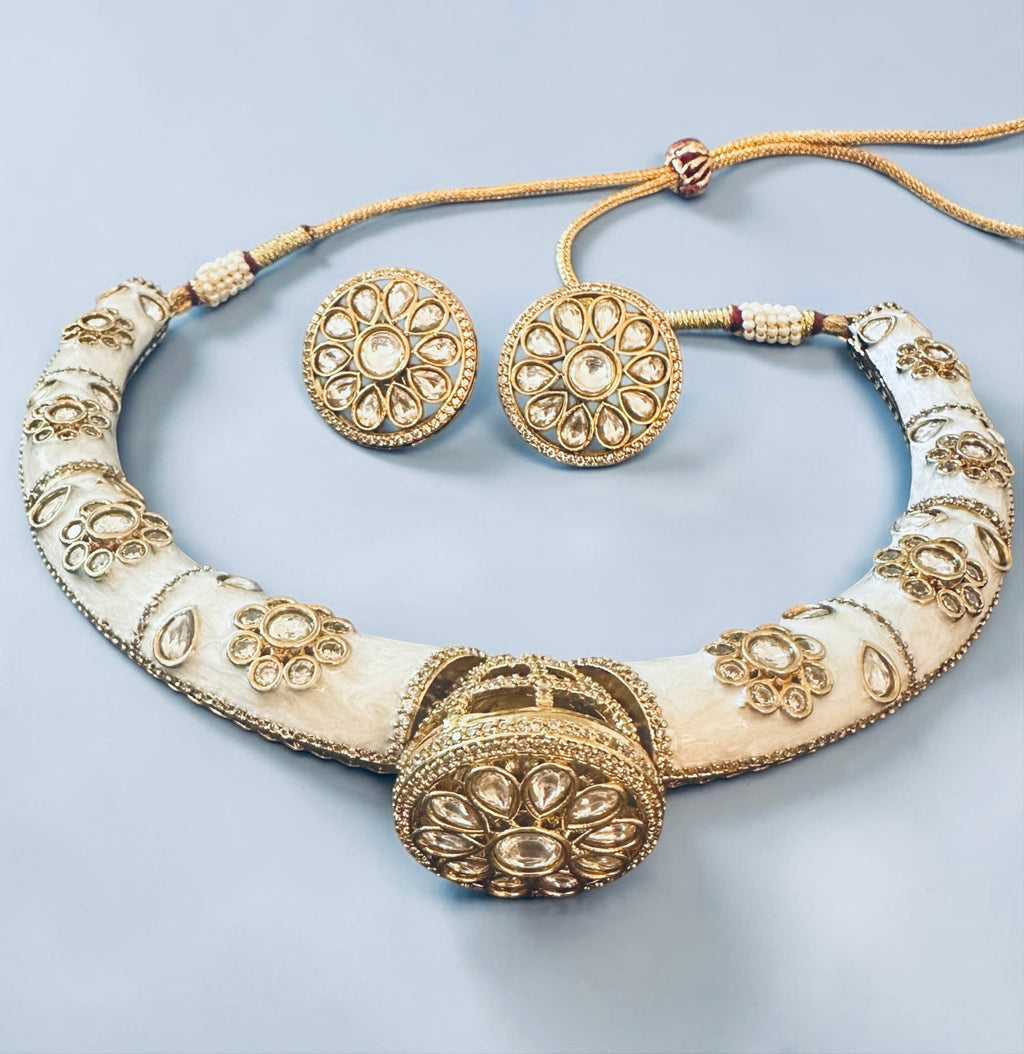 White kundan hasli set
