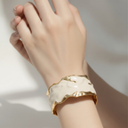 White bracelet with gold