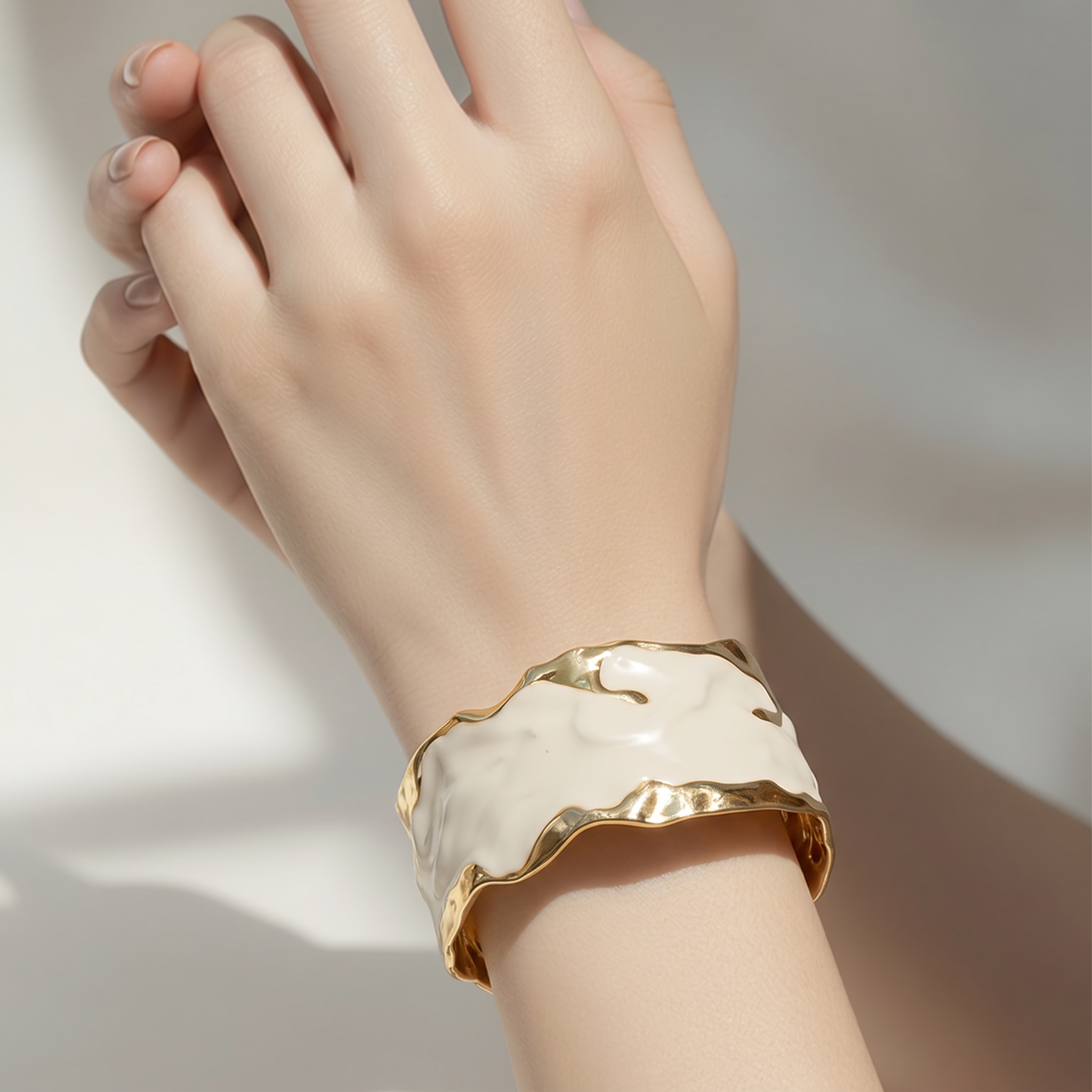 White bracelet with gold