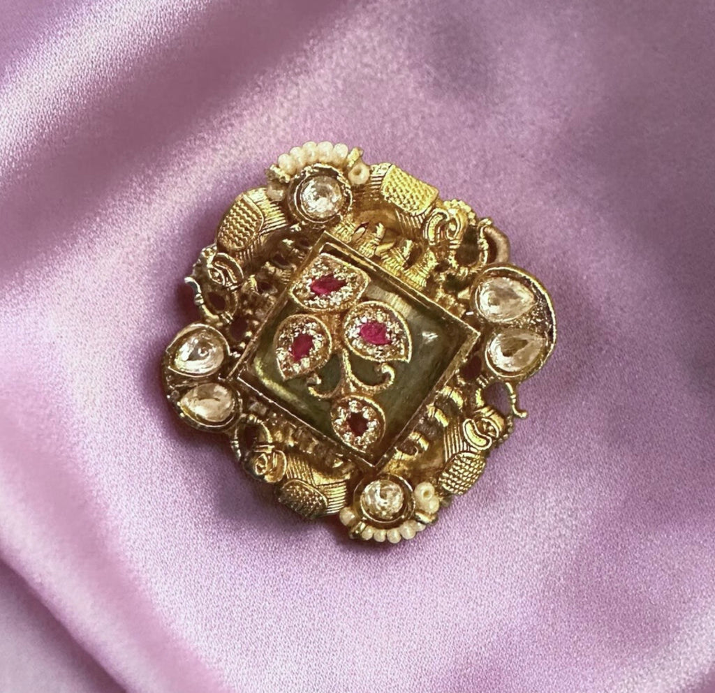 Mint green n ruby ring