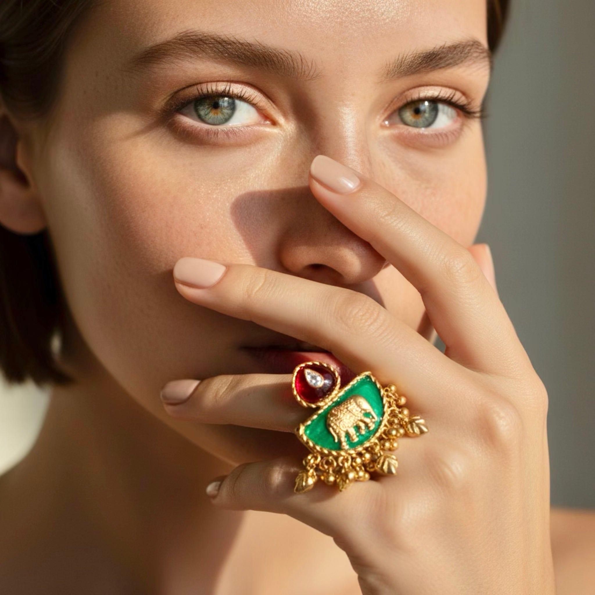 Elephant motif emerald ring