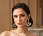 Ad earrings with pearl drops