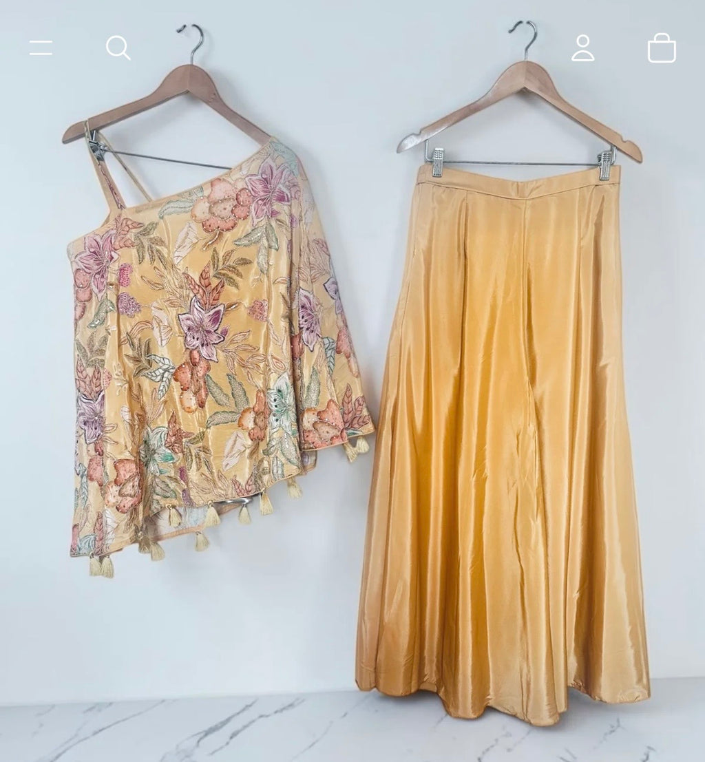 Beige one-shoulder outfit