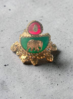 Elephant motif emerald ring