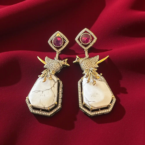 Bird motif ruby n white stone earrings