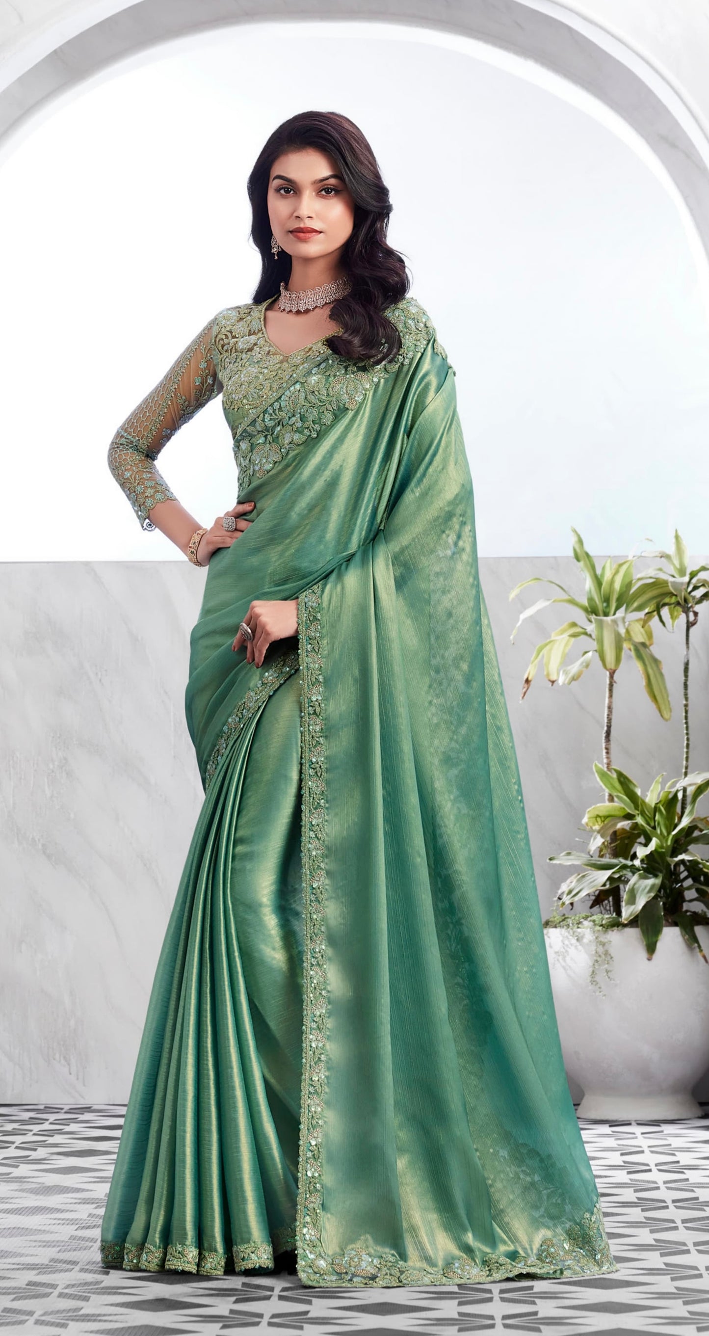 Sea-green shimmer georgette saree